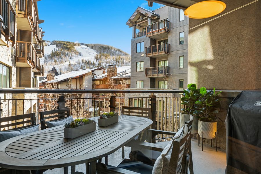 The Lion — slope-side deck with mountain views